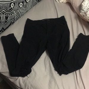 High waisted distressed knee black skinny jeans